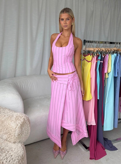 Pink i am delilah sabrina set on a woman standing next to i am delilah garments